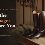 Leather riding boots and tweed coat on a tack-room bench, headline 'Vet the Manager Before You Join'