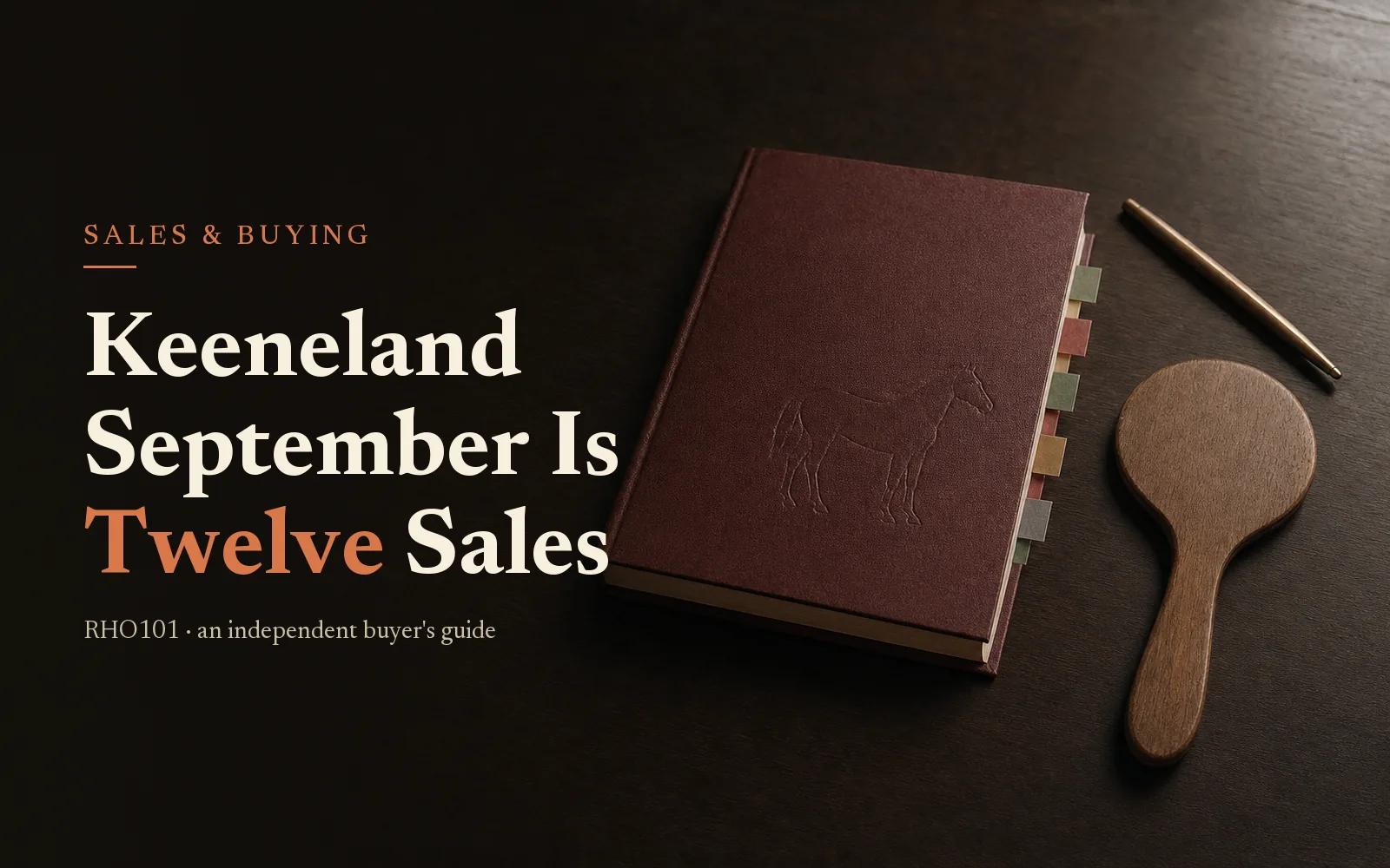 Oxblood yearling sale catalogue and bidder's paddle on dark oak, headline Keeneland September Is Twelve Sales