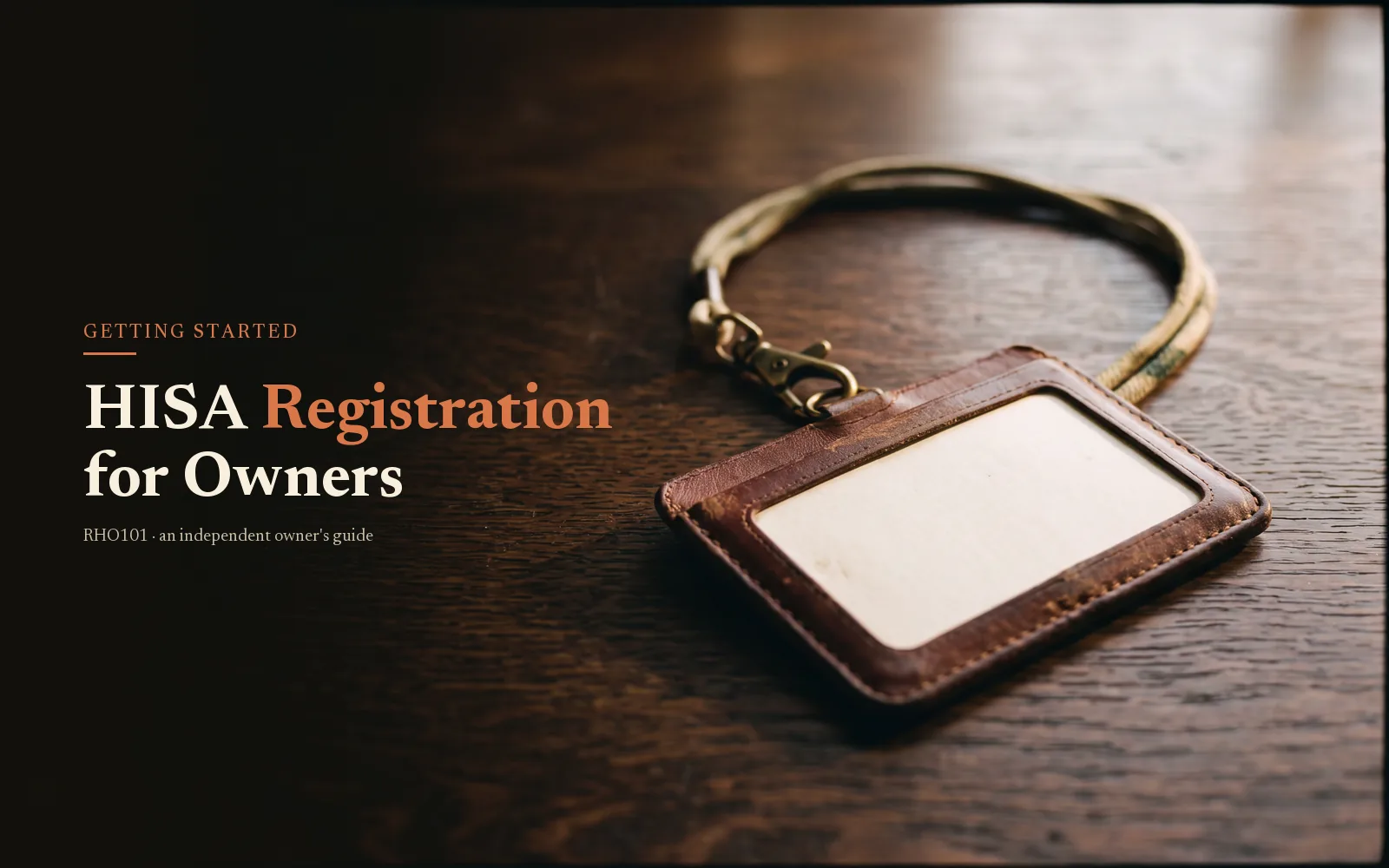 Worn leather badge holder and brass lanyard on a dark oak desk, headline HISA Registration for Owners